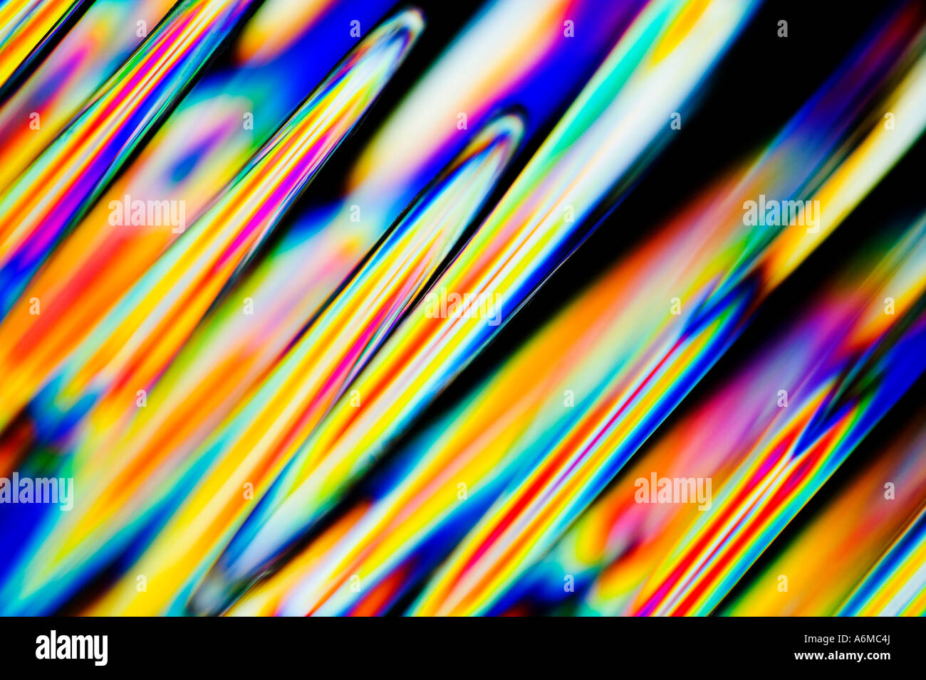 Cross Polarised abstract image of plastic forks taken with a macro lens close-up showing stress patterns Stock Photo