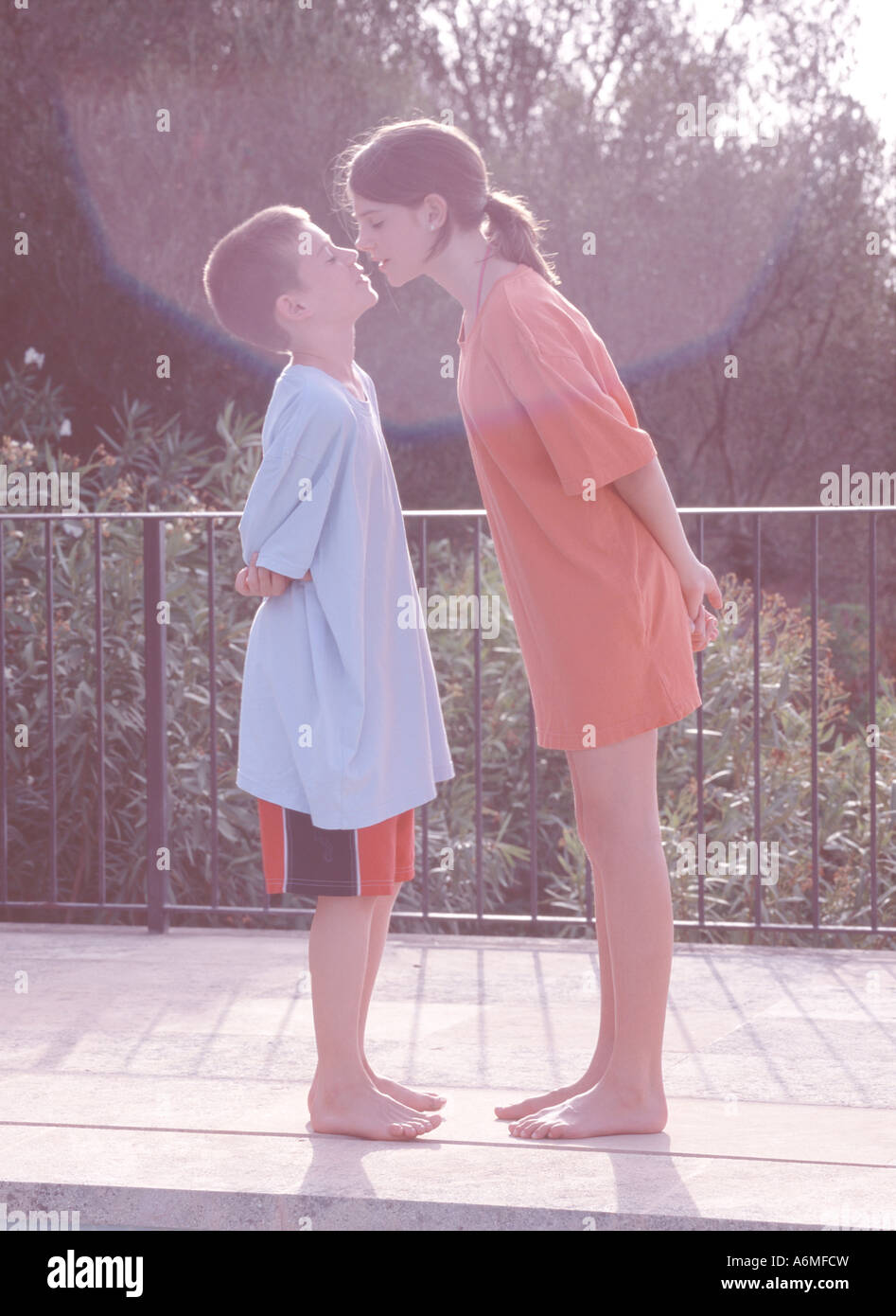 Sister and brother rubbing noses Stock Photo Alamy