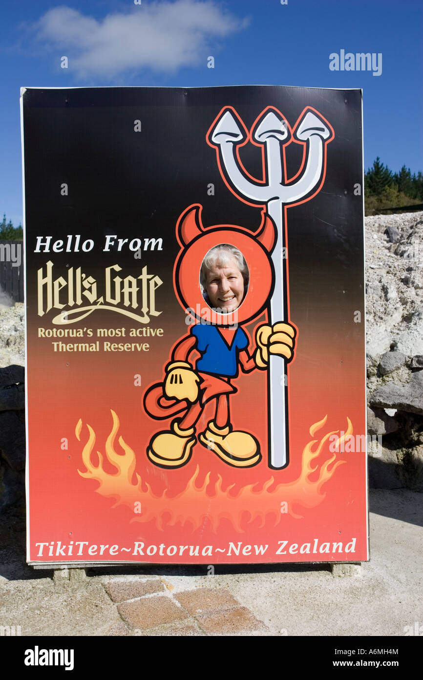 Amusing signboard at entrance to Waiora Spa Hells Gate geothermal reserve Tikitere Rotorua North Island New Zealand Stock Photo