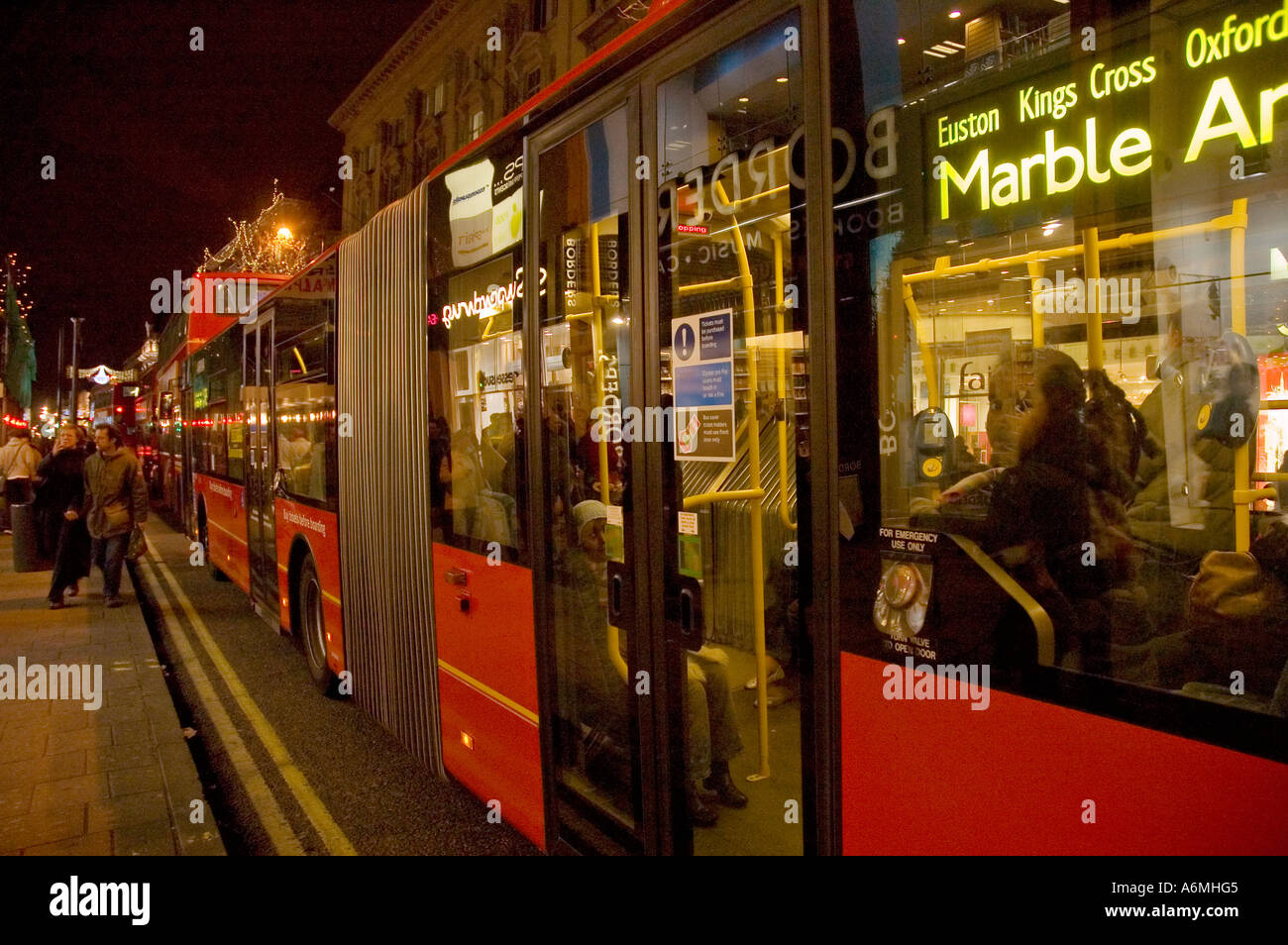 Christmas lights and Red buses, Oxford Street, London, UK Stock Photo