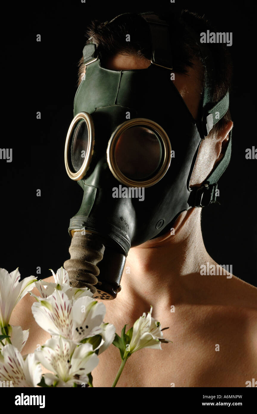 Man in gas mask flowers hi-res stock photography and images - Alamy