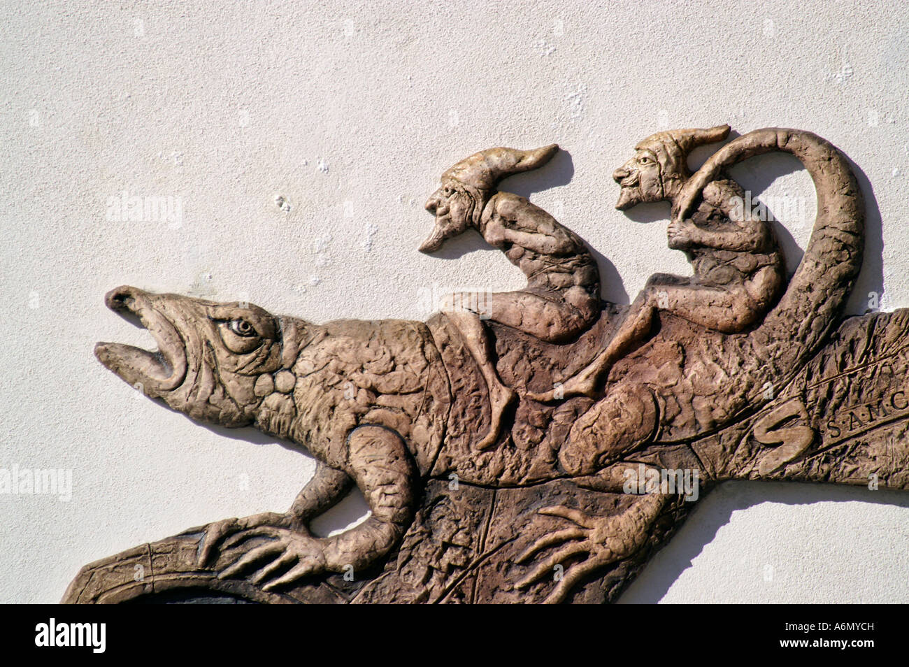 Two dwarves riding lizard, relief detail in Banska Stiavnica, Slovakia ...