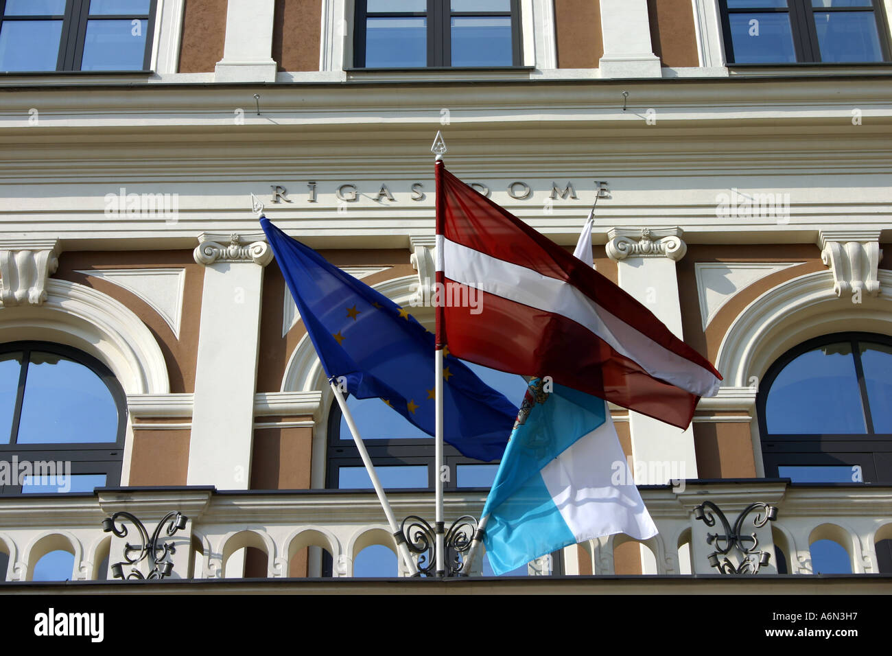 LATVIAN, RIGAN AND EU FLAG on City Hall in Riga in Latvia Stock Photo