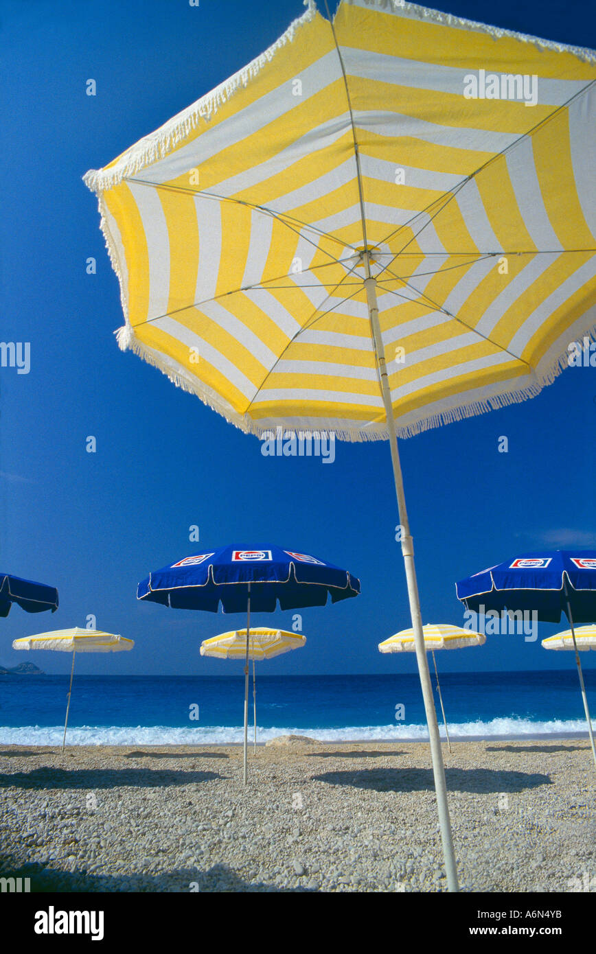 umbrellas on Kaputas beach south coast nr Kas Turkey Stock Photo
