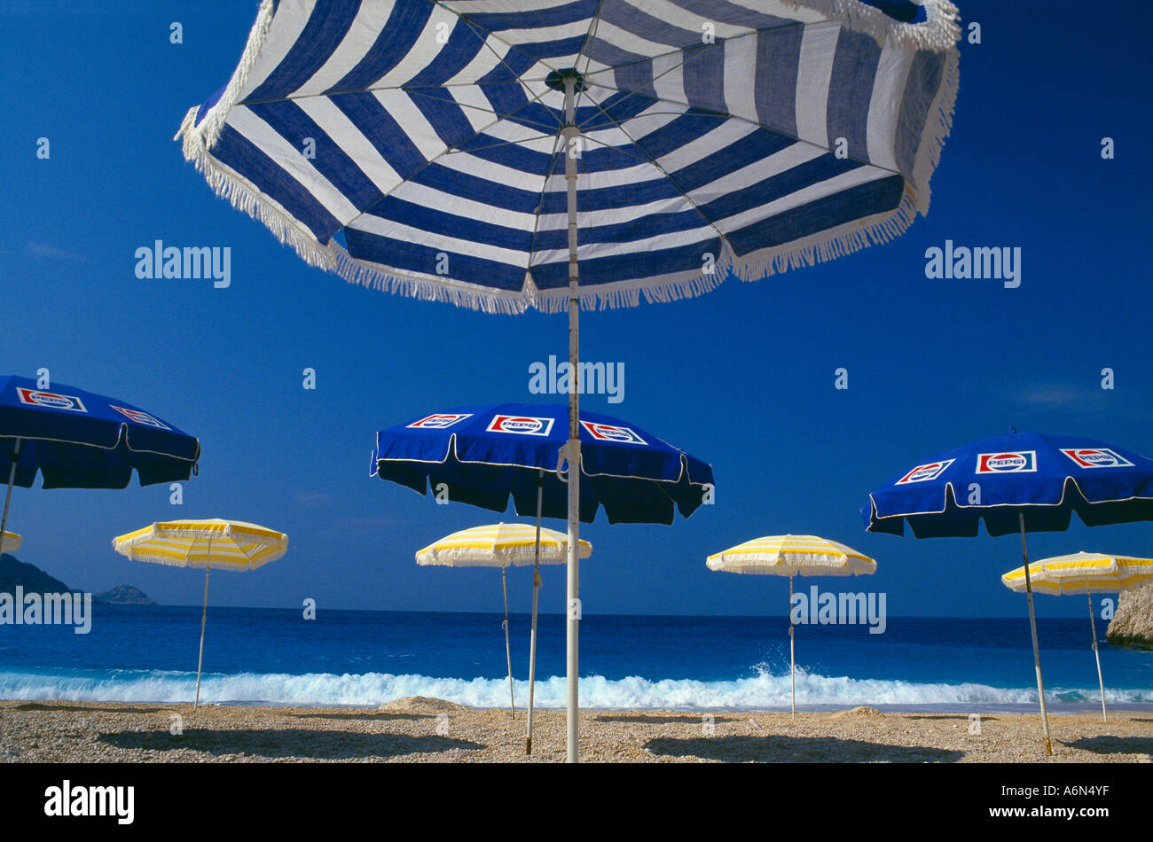 umbrellas on Kaputas beach South coast Turkey Stock Photo