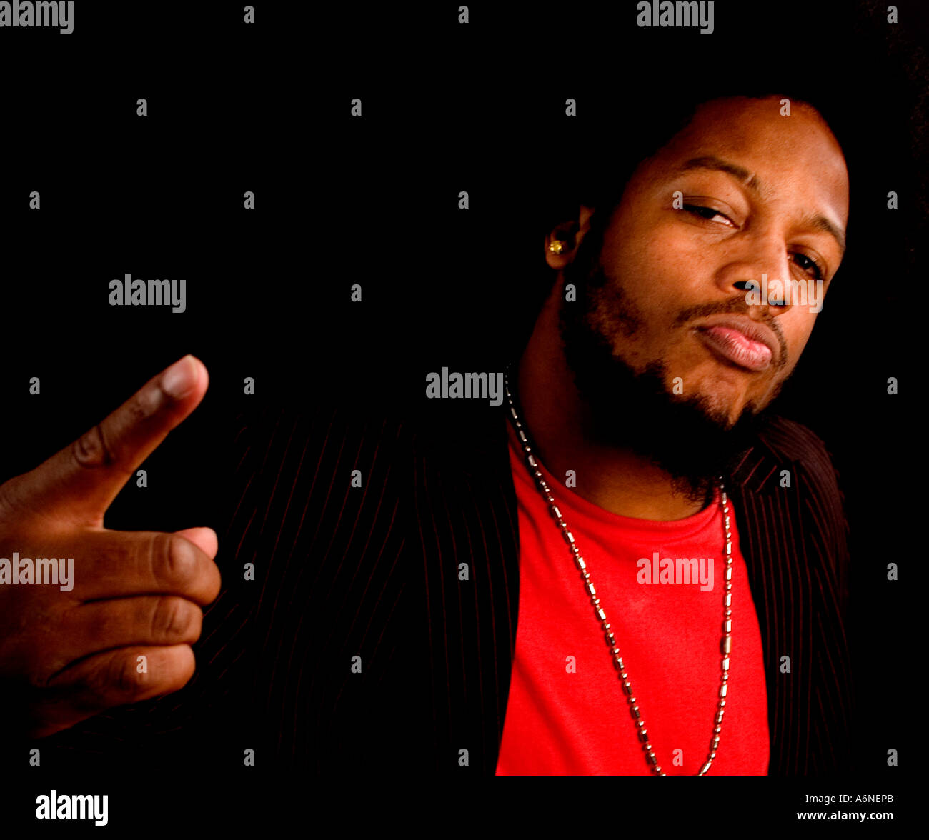 Black man pointing Stock Photo - Alamy