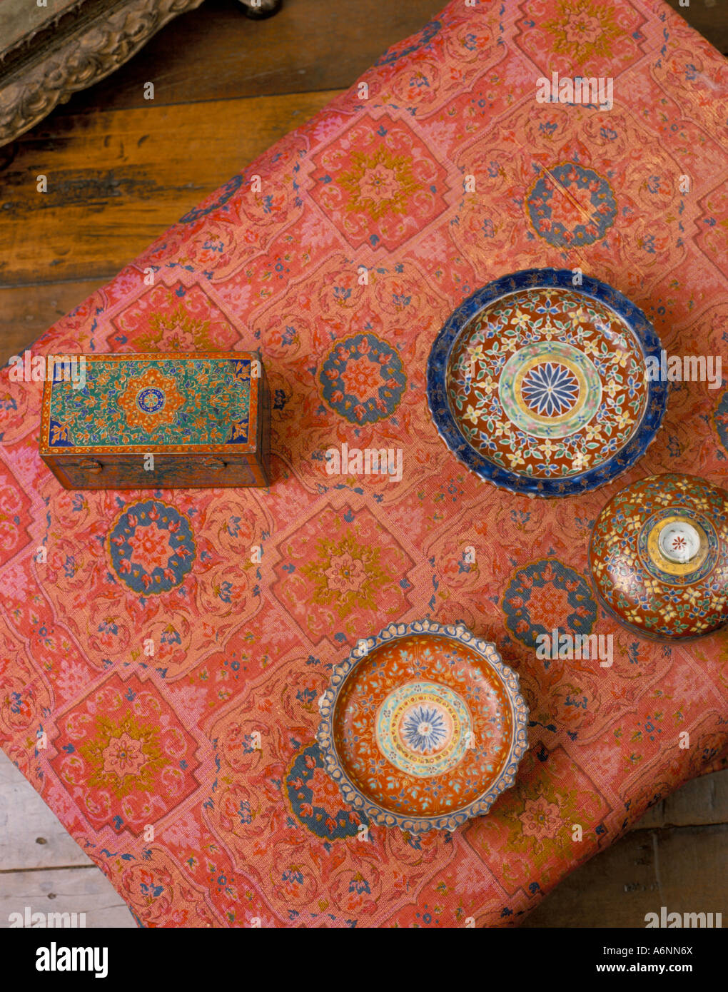 Overhead view of Bencharong ceramics and silk designed by Jim Thompson Jim Thompson s House Bangkok Thailand Southeast Asia Stock Photo