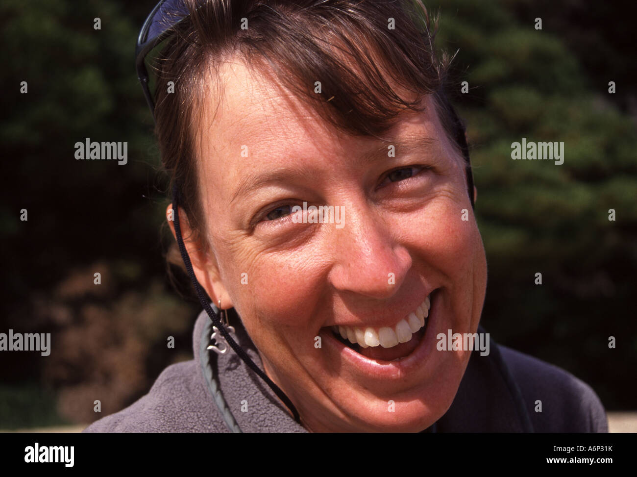 Portrait of a woman smiling Stock Photo - Alamy