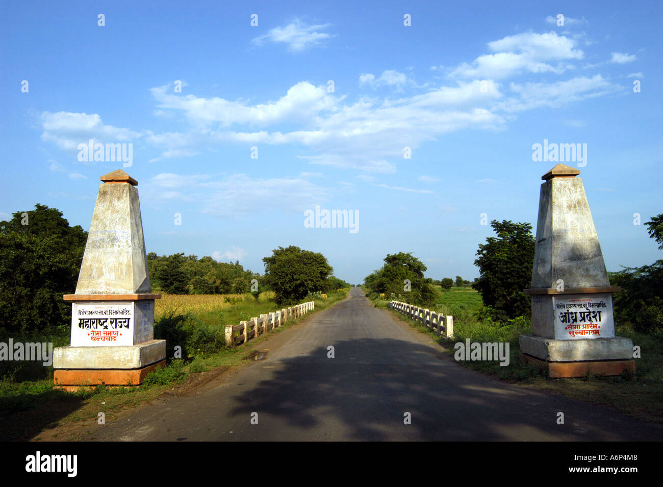 Two indicator pillars on either side of road marking boundary of Maharashtra and Andhra Pradesh state India Stock Photo