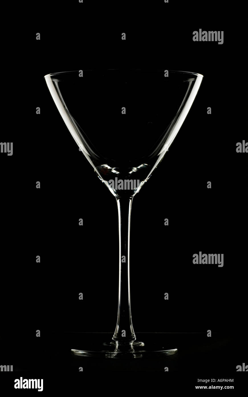 Empty cocktail glass, rim light Stock Photo - Alamy