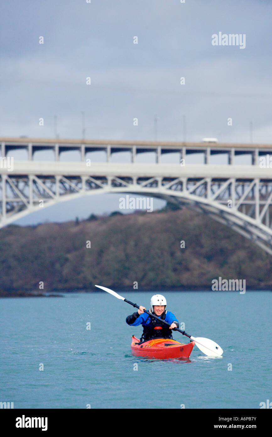 Canoe passing under the Britannia Bridge on the Menai Straits, Anglesey