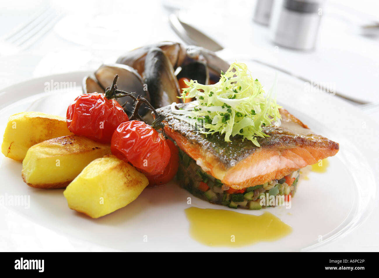 salmon with mussels and vegetables Stock Photo Alamy