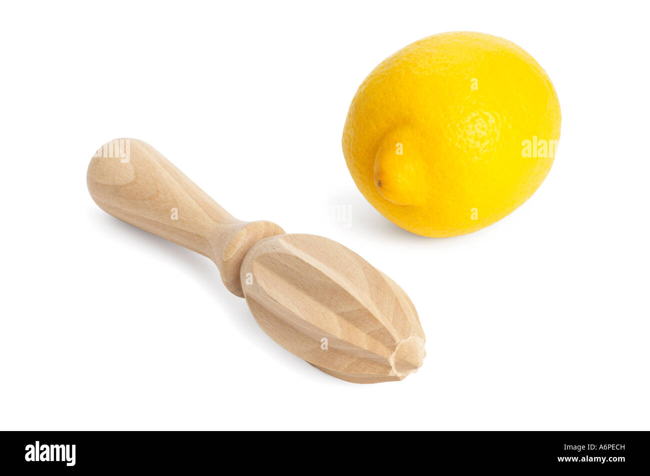 Wooden reamer and whole lemon Stock Photo Alamy