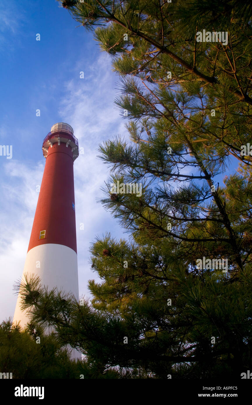The tall red and white lighthouse in Barneget New Jersey is a popular tourist destination and landmark  Stock Photo