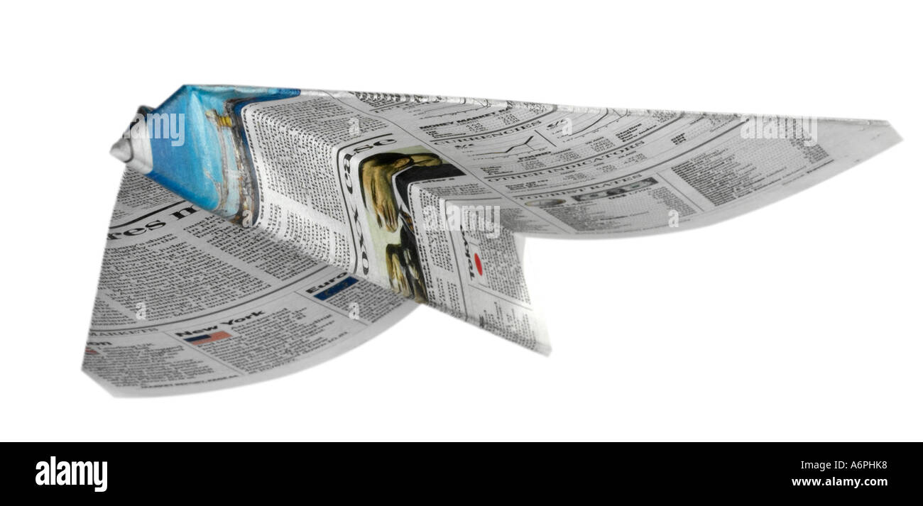 A person throwing a Paper airplane made from newspaper Stock Photo Alamy