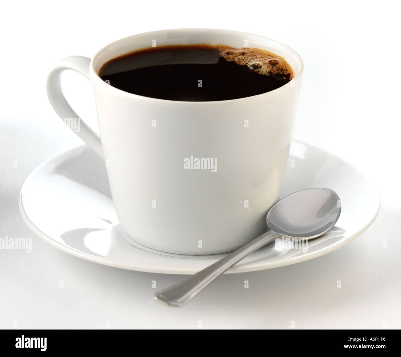 A CUP OF BLACK COFFEE IN WHITE CUP AND SAUCER Stock Photo
