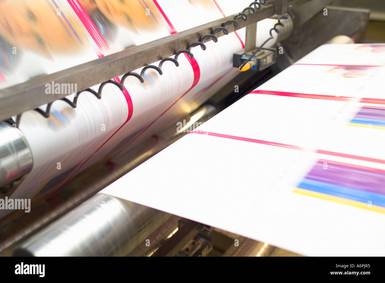 PRINTED MAGAZINE/ NEWSPAPERS GOING THROUGH INDUSTRIAL SCALE PRINTERS