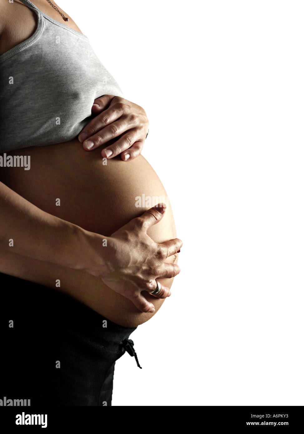 PREGNANT LADY HOLDING TUMMY CUT OUT ON WHITE BACKGROUND Stock Photo - Alamy