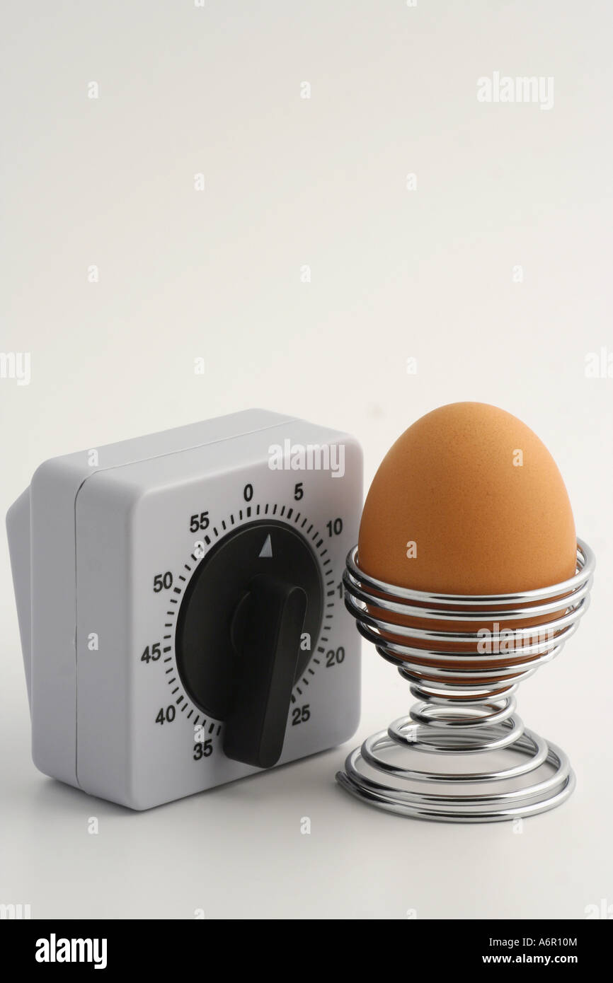 Timer and egg Stock Photo - Alamy
