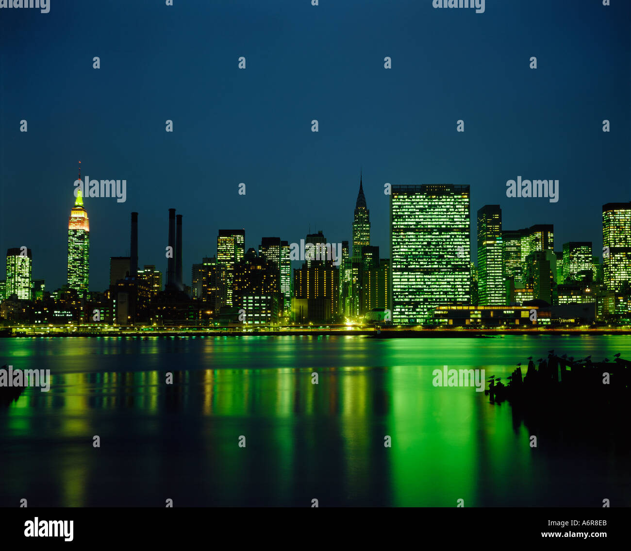 Empire State Building and New York skyline at night Stock Photo - Alamy