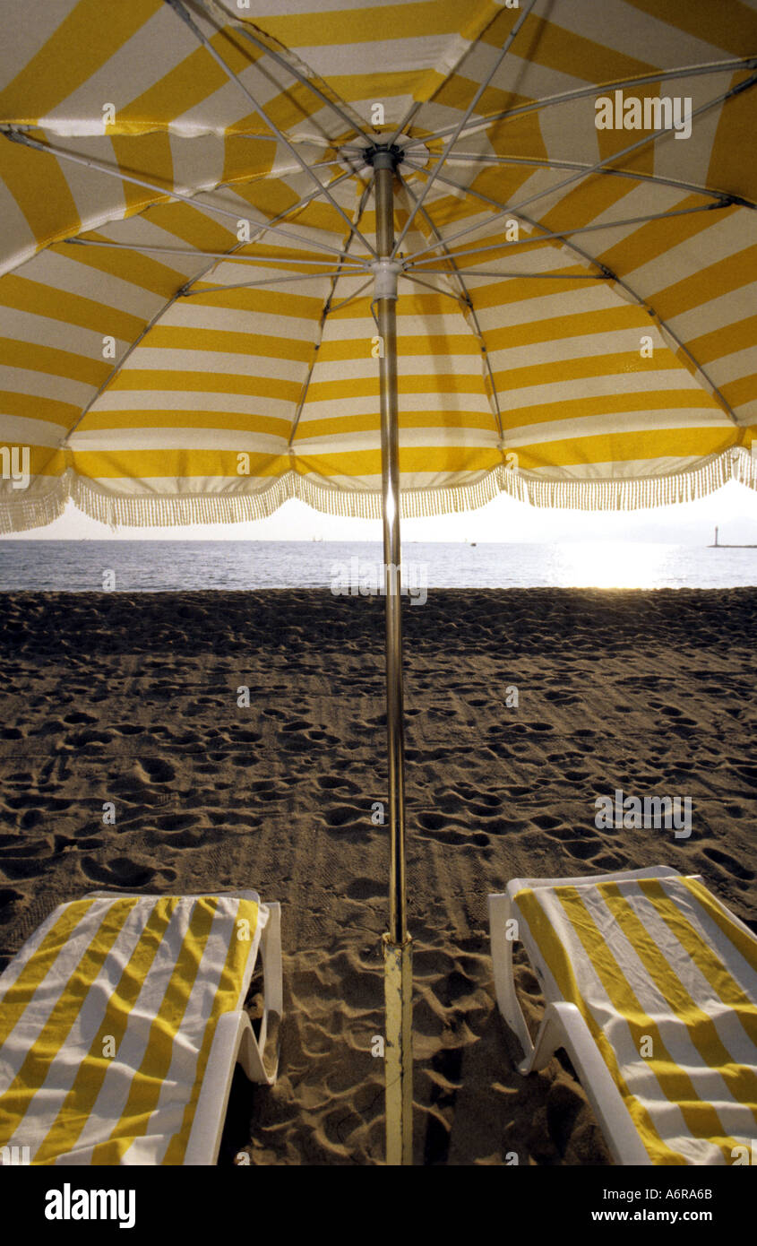 Saint Tropez beach summer vacation France sun parasol sunshade Stock Photo  - Alamy