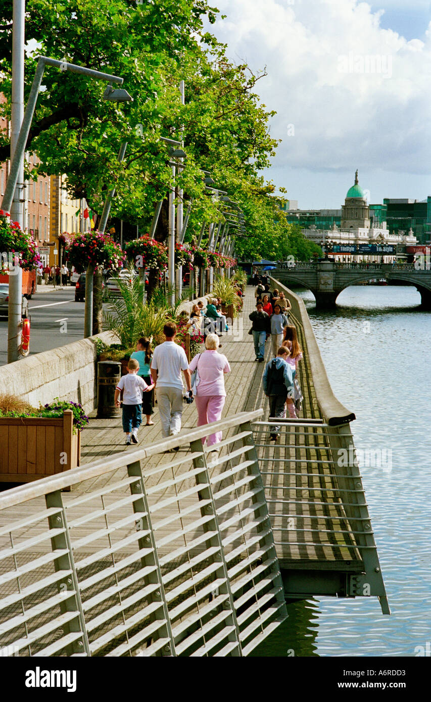 The riverside boardwalk on the banks of the Liffey Dublin Ireland Stock Photo