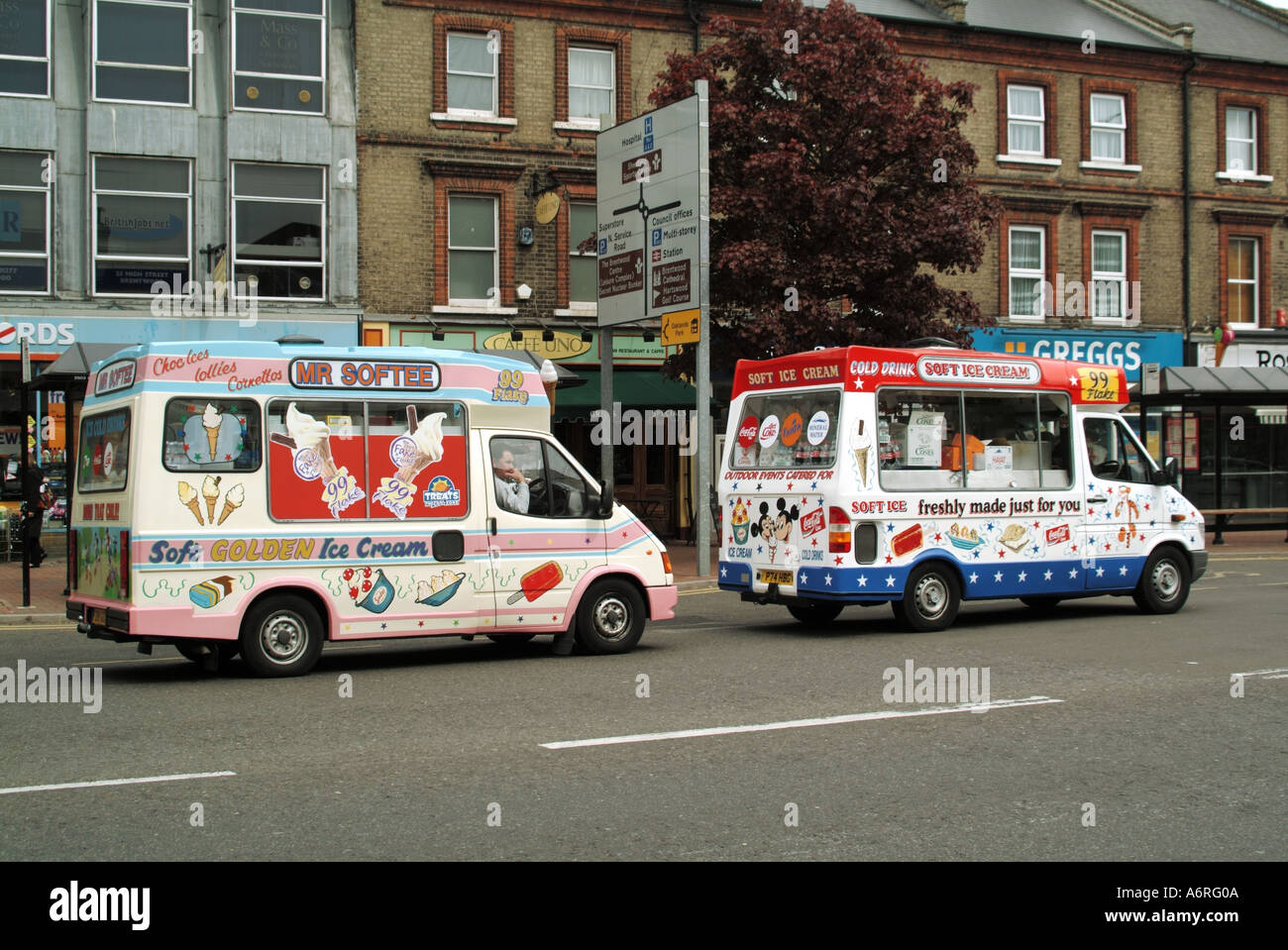 Brentwood two different business brands of ice cream sellers in vans