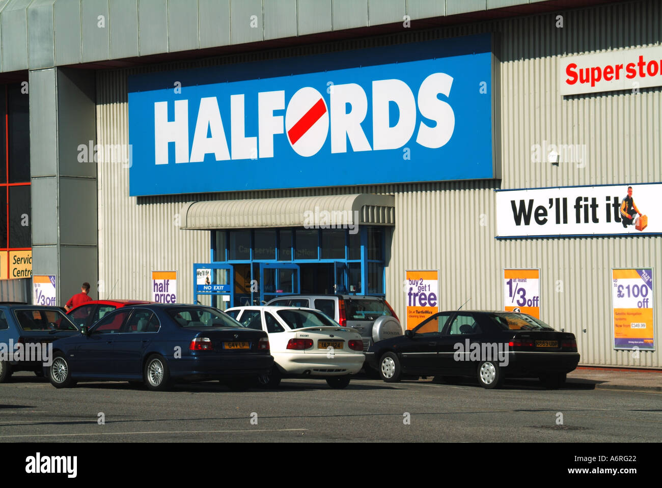 West Thurrock Lakeside retail park with cars parked outside Halfords