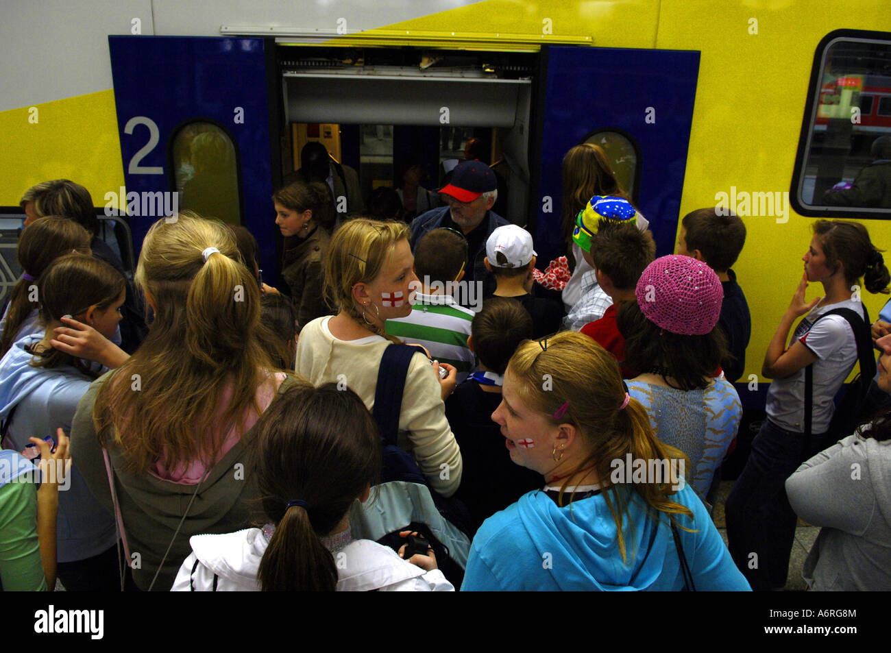 crowd teens teenagers germany german deustchland dortmund underground u bahn public transport transportation train boarding crow Stock Photo