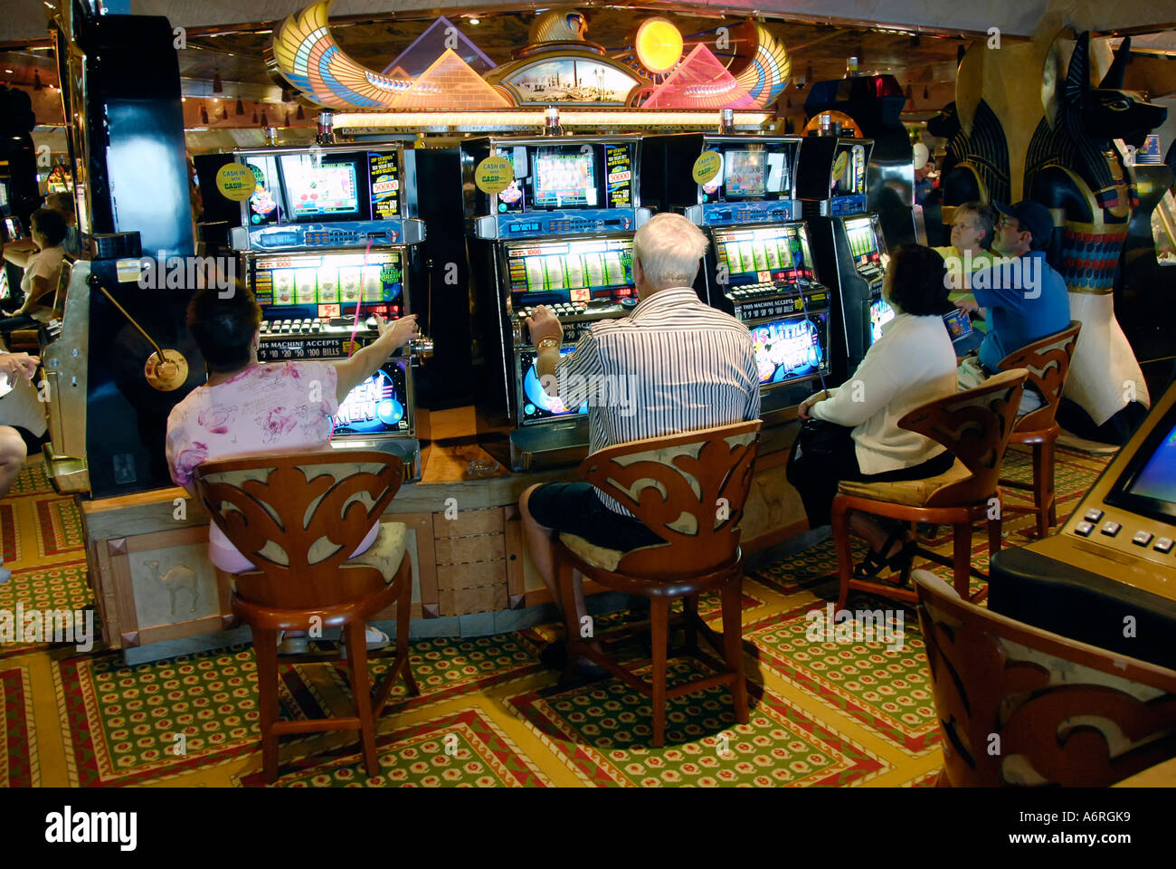 Gambling at slot machines aboard the Cruise Ship Carnival Fantasy Stock Photo