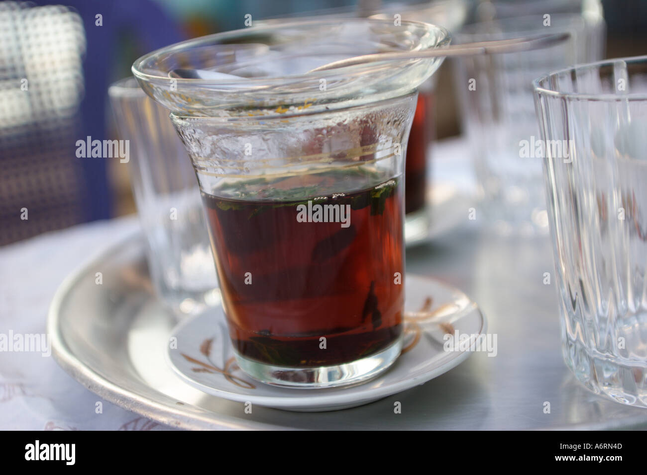 steamy hot black tea with mint leaves, anytime of the day is good for