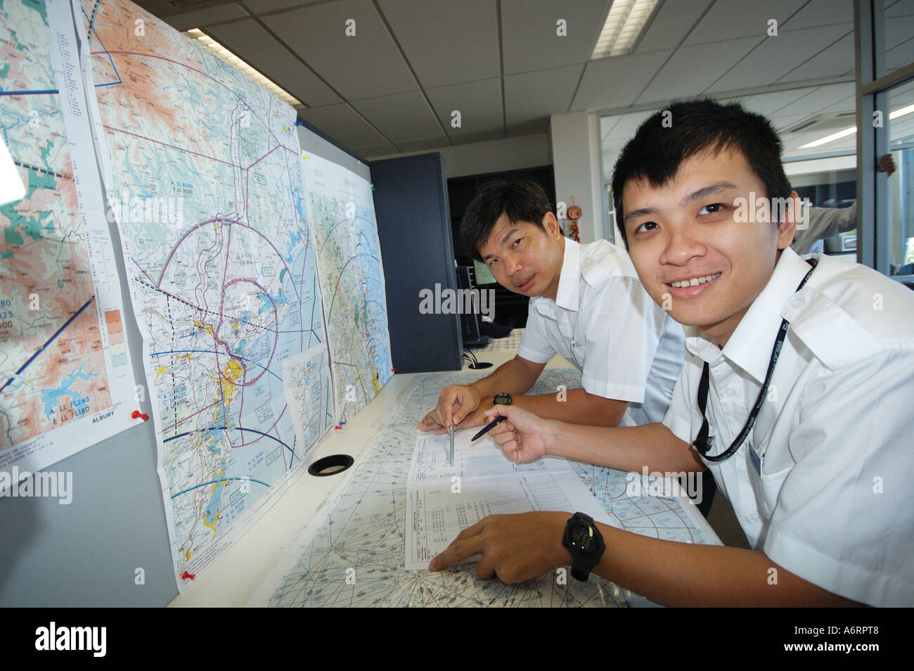 Pre flight map checks for trainee pilots Stock Photo