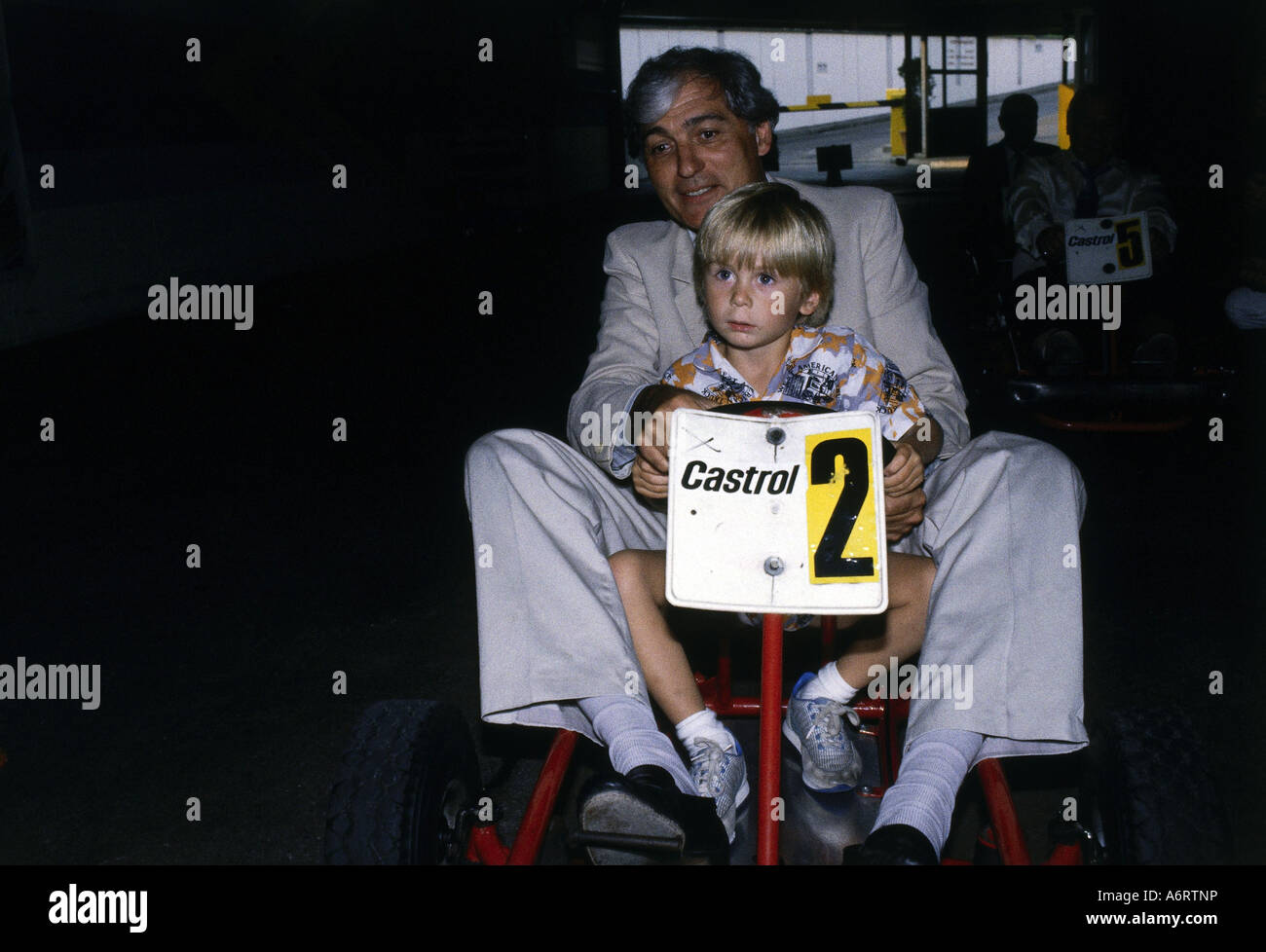 Pfleghar, Michael, 20.3.1933 - 23.6.1991, German director, half length, with his son Michael, driving kart, 1980s, child, 80s, r Stock Photo