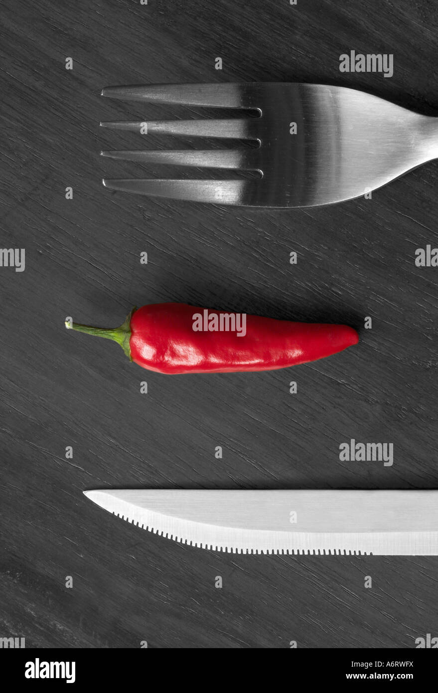 Part monochrome image Chilli pepper with knife and fork variety Apache