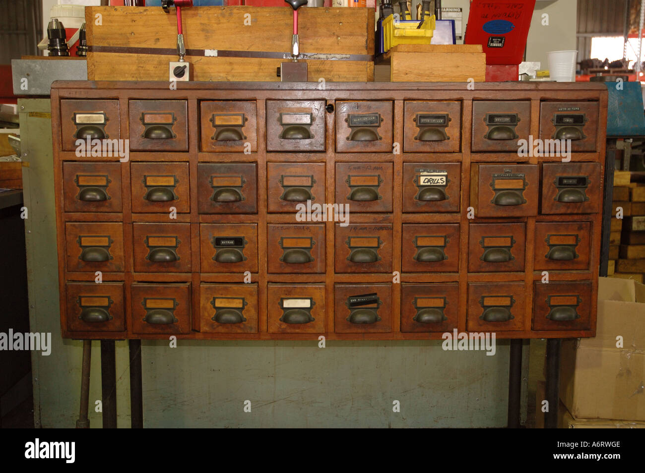 Old Timber Card File Cabinet Used For Tool Storage Stock Photo