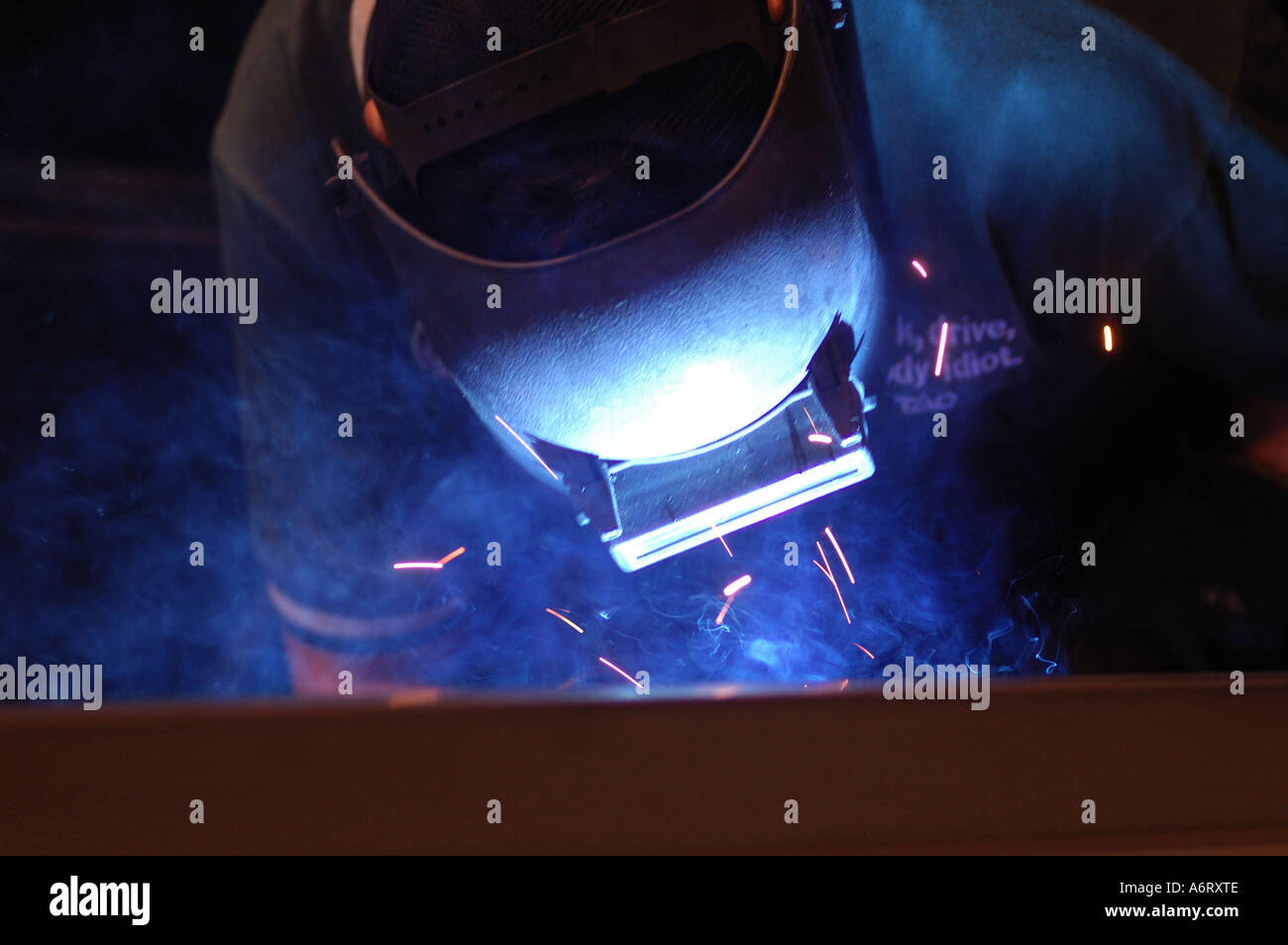 welder in metal workshop Stock Photo
