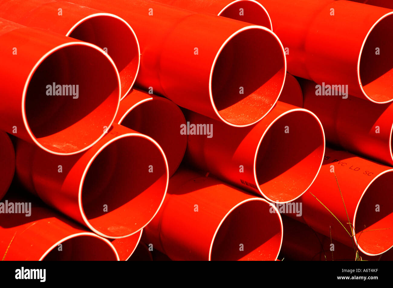 Bright orange water and sewerage pipe Stock Photo Alamy