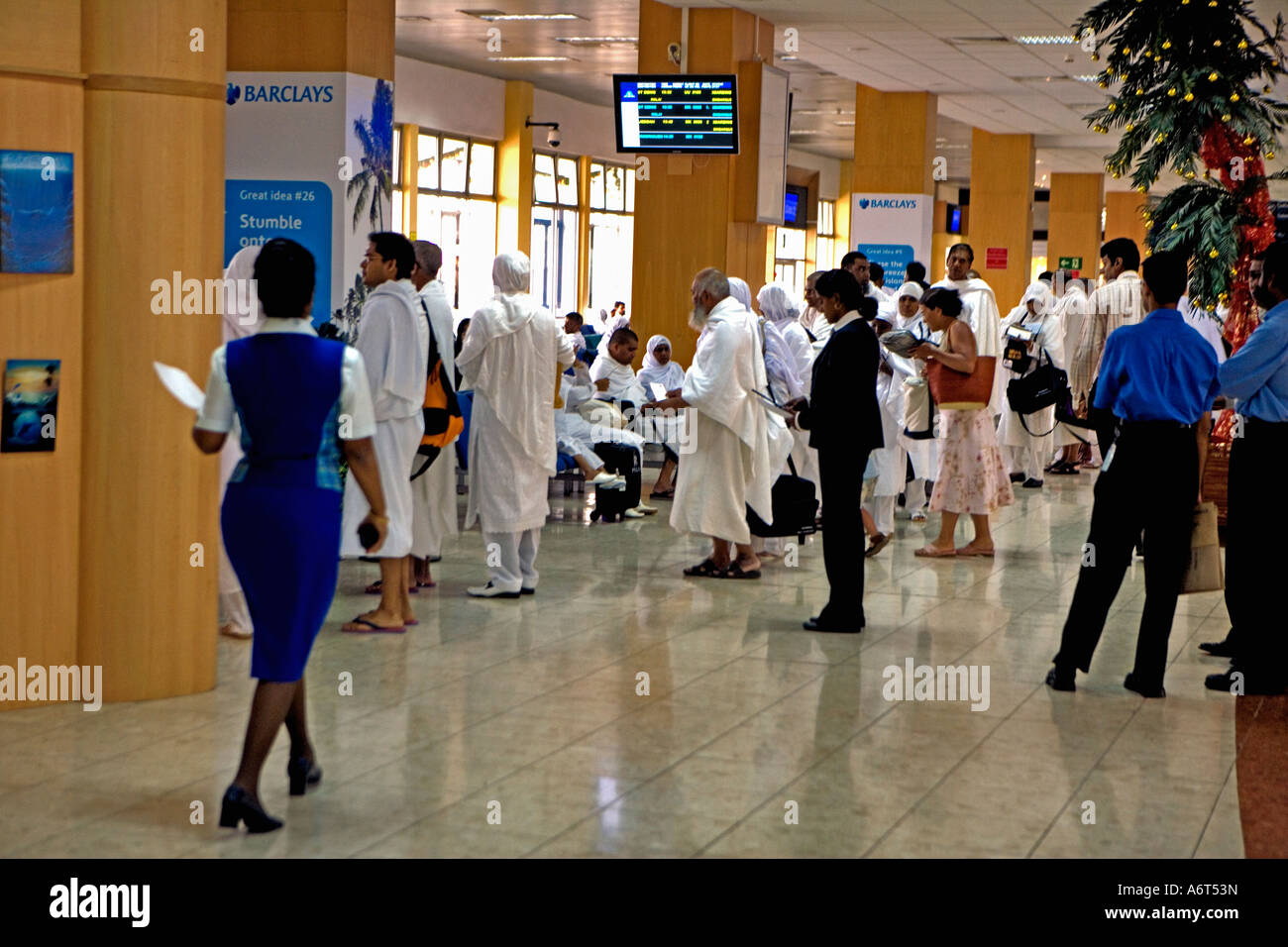 Hajis departing from Mauritius on flight to Jeddah for Hajj in Mecca Stock Photo