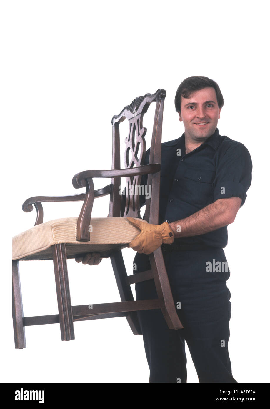 moving man with chair silhouetted on white background stock