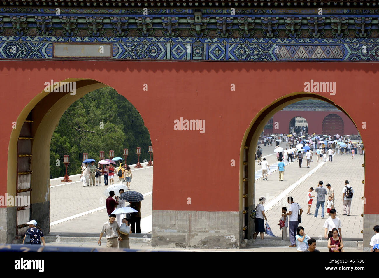 China Beijing The Temple Of Heaven Gate And Crowd At Tiantan Park On A Sunday Afternoon Stock Photo