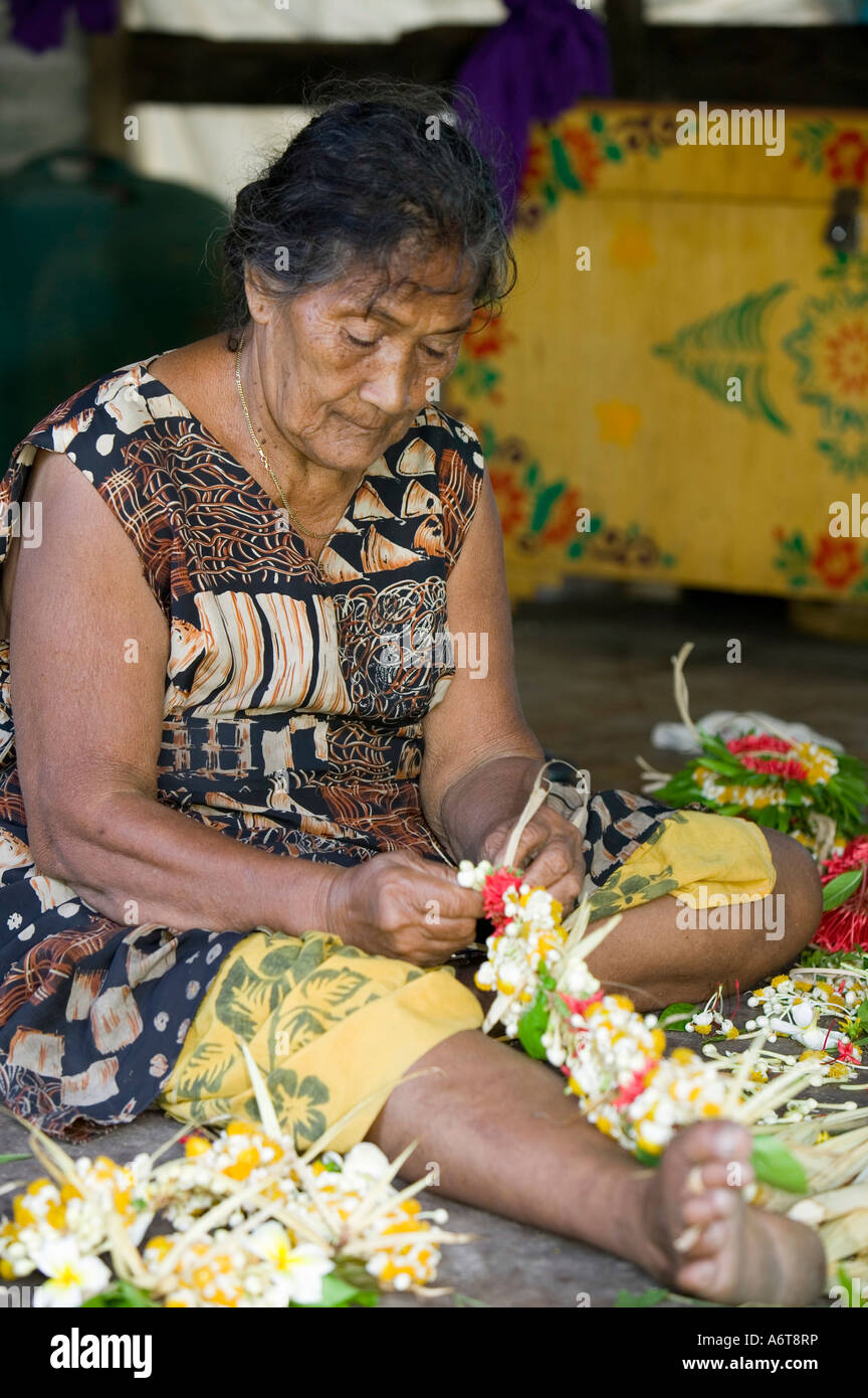 Tuvaluan women creating traditional flower head dresses, Funafuti