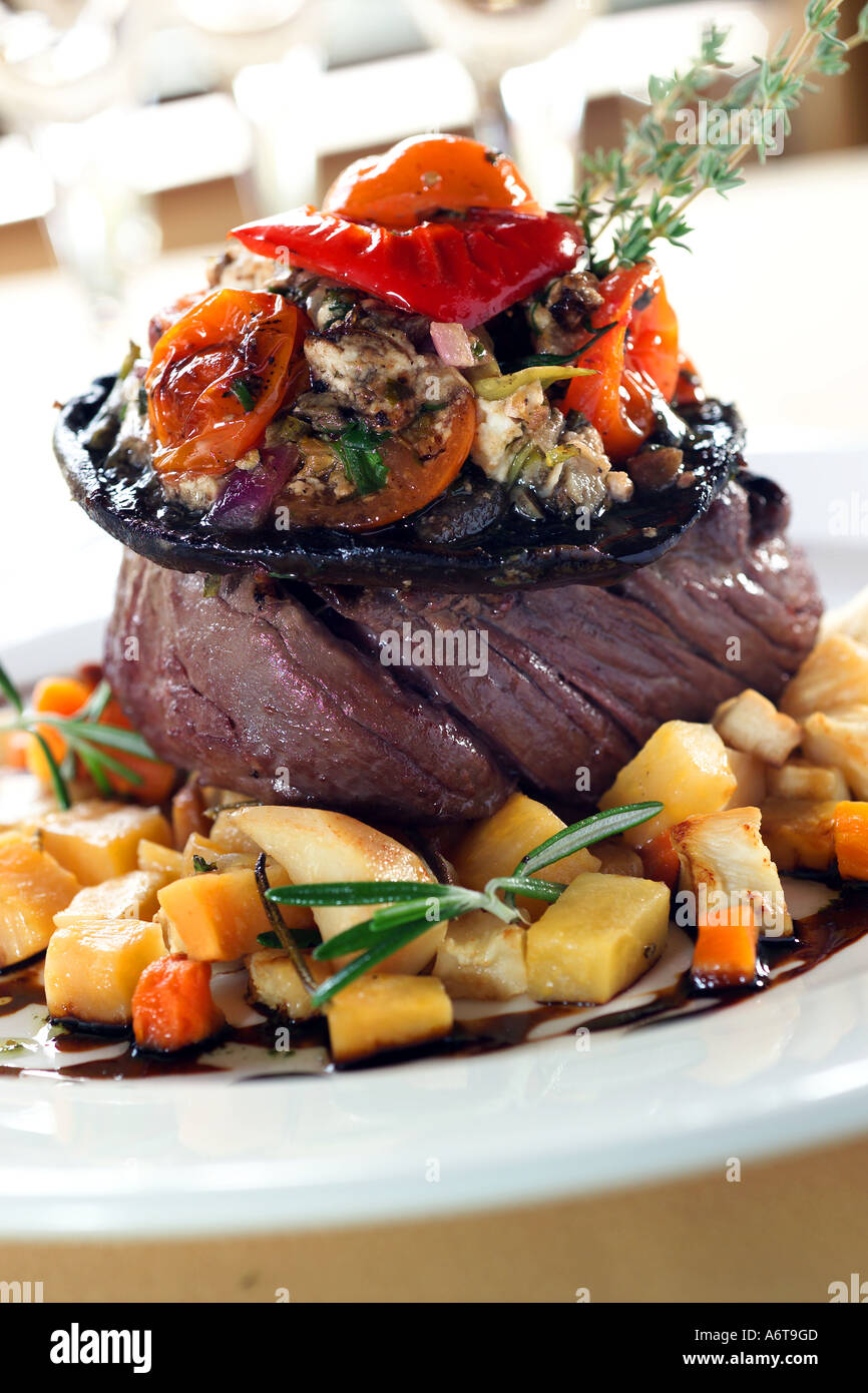 Pan fried fillet Steak with seasonal roast vegetables Stock Photo Alamy