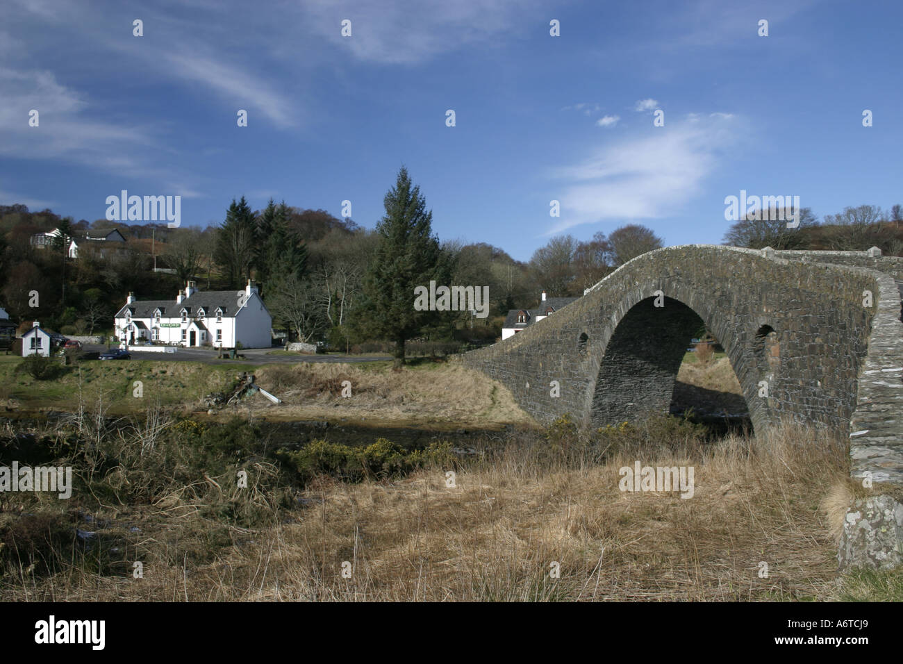 The Atlantic Bridge cuts over a narrow channel of the North Atlantic and leads to the island of Seil, Scotland Stock Photo