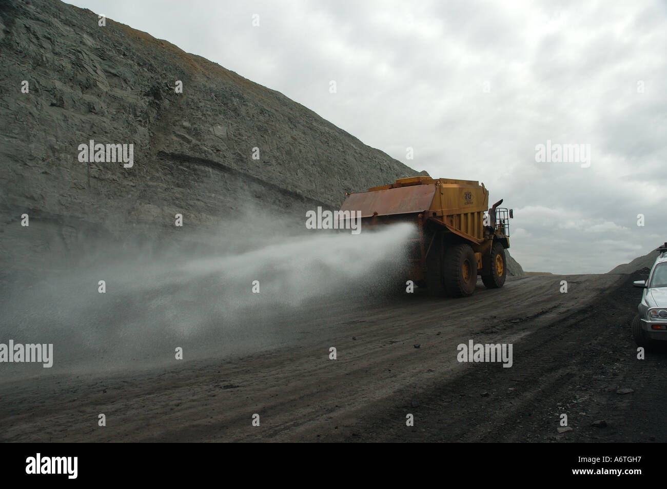 Water tanker in open cut coal mine Queensland Australia Stock Photo - Alamy
