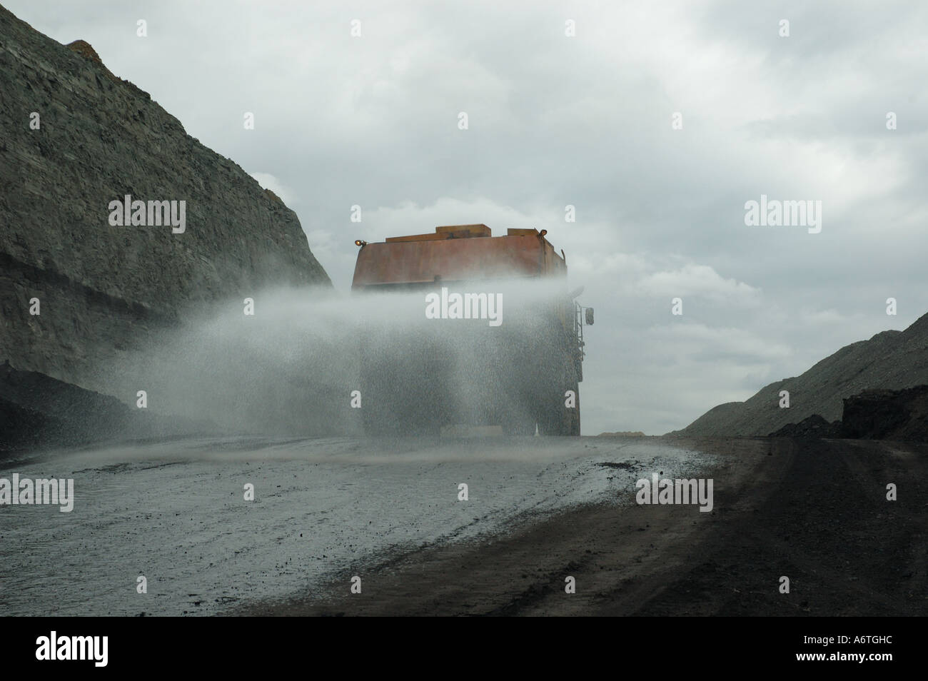 Water tanker in open cut coal mine Queensland Australia Stock Photo - Alamy