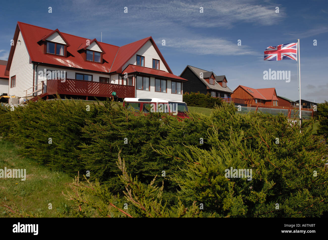 A newly built house in east Stanley, a new development of Stanley capital of the Falkland Islands proudly flies the British Flag Stock Photo