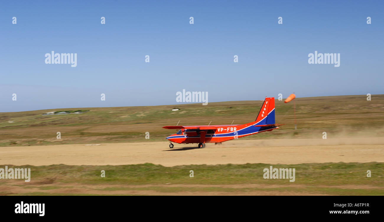 Falkland Islands Government Air Service (FIGAS) plane landing on Sea Lion Island Stock Photo
