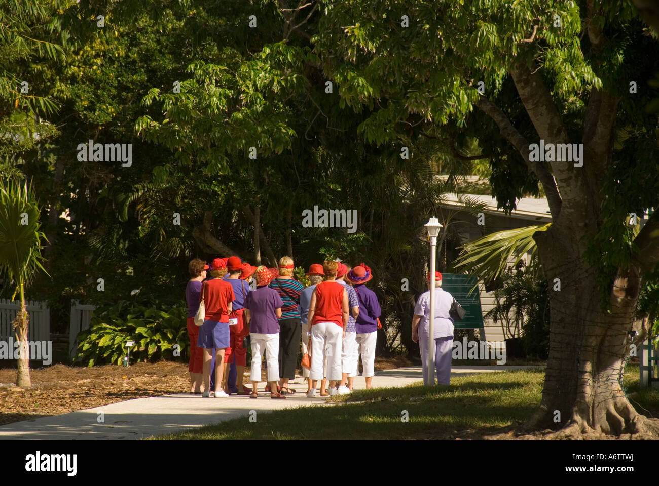 Thomas Edison winter home estate Fort Myers Florida tourists on tour on botanical gardens walkway Stock Photo
