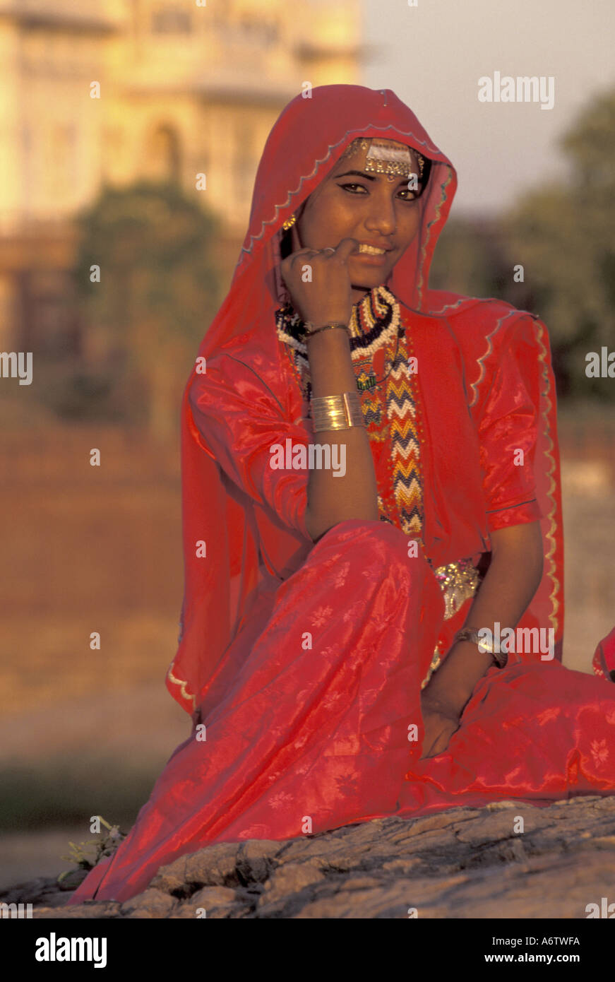 India, Jodhpur, Young woman in red dress (MR Stock Photo - Alamy