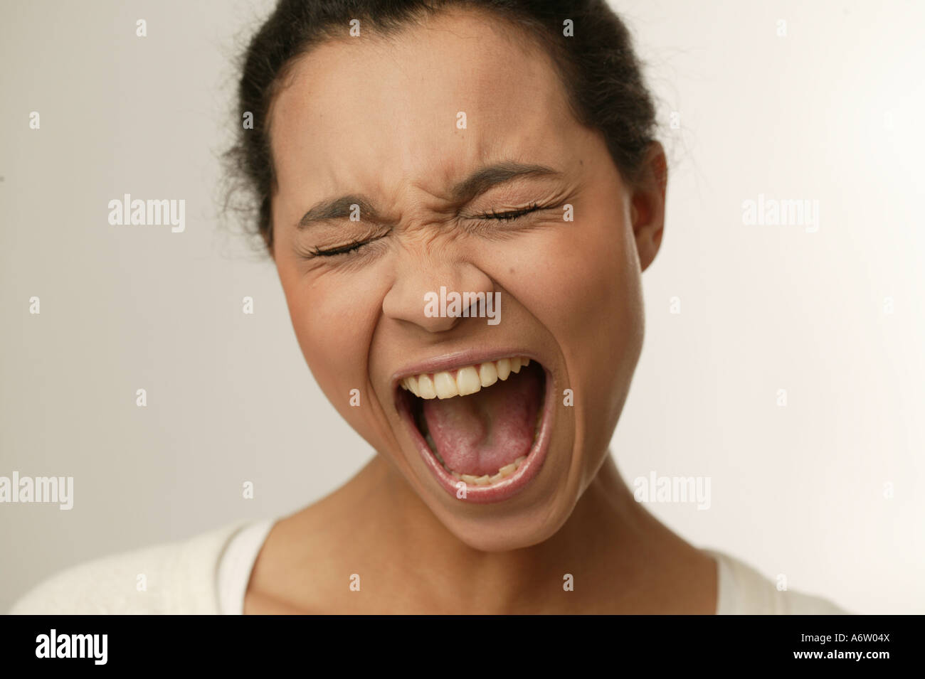 Screaming young girl Stock Photo
